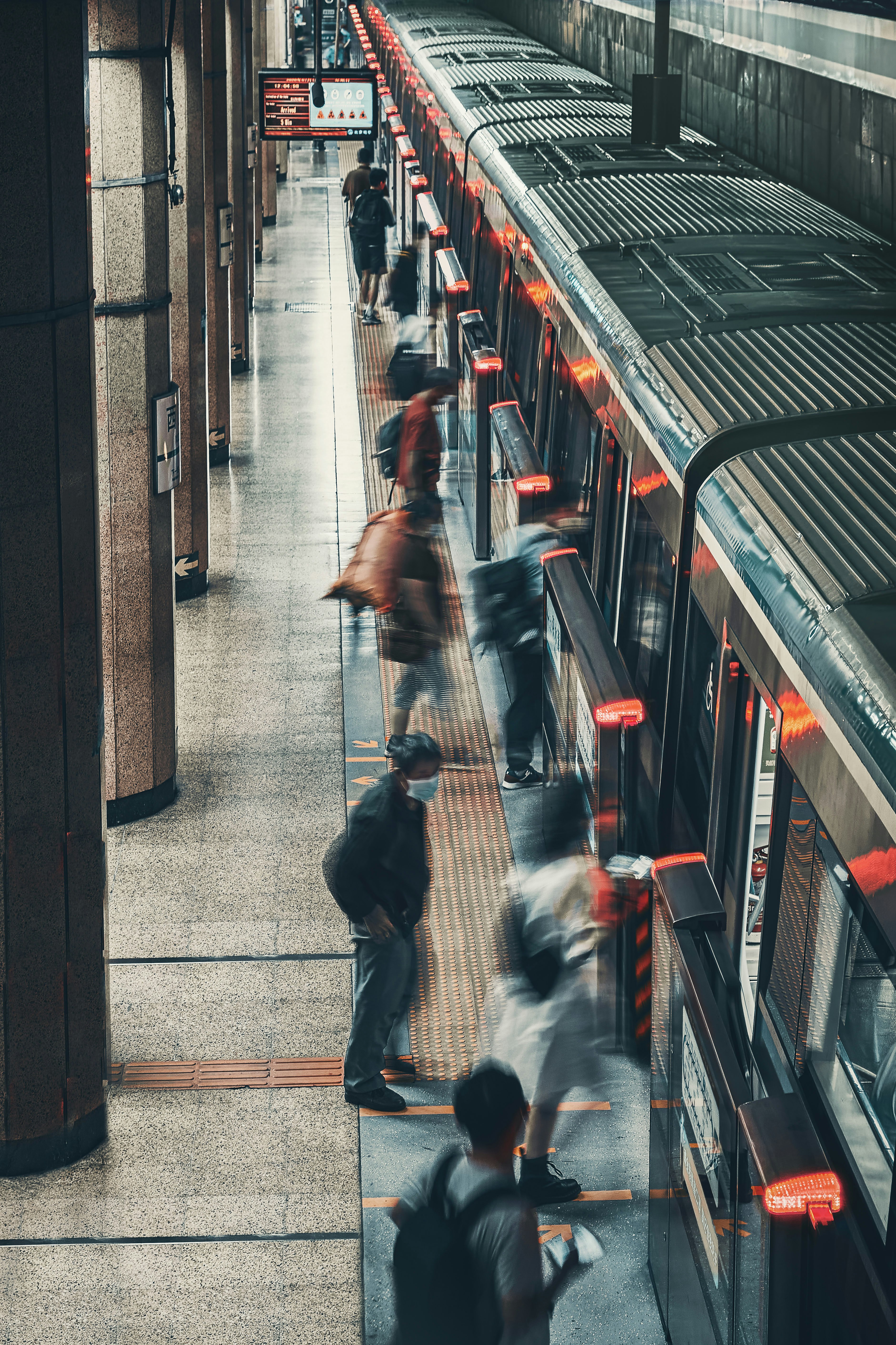 people walking on train station